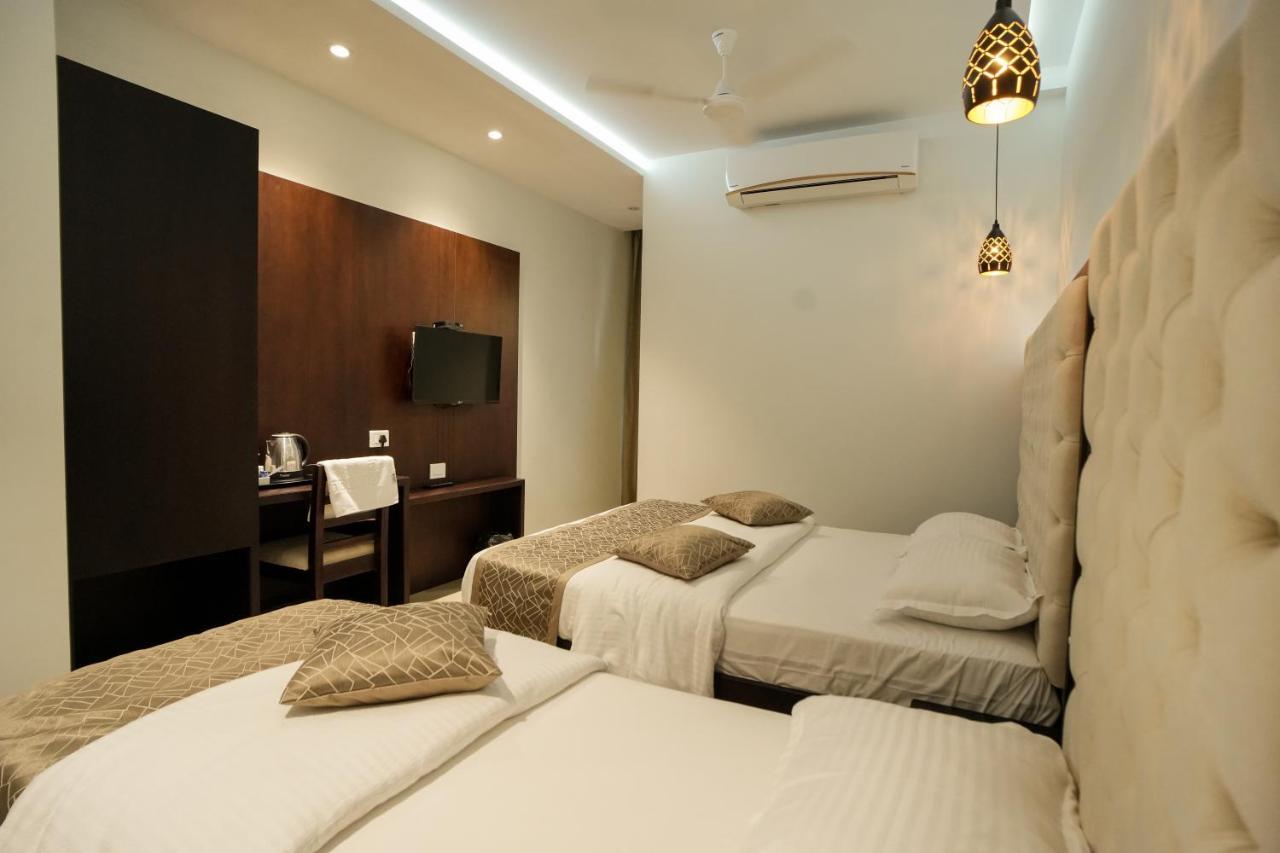 Sulu Residency Hotel Kochi Buitenkant foto