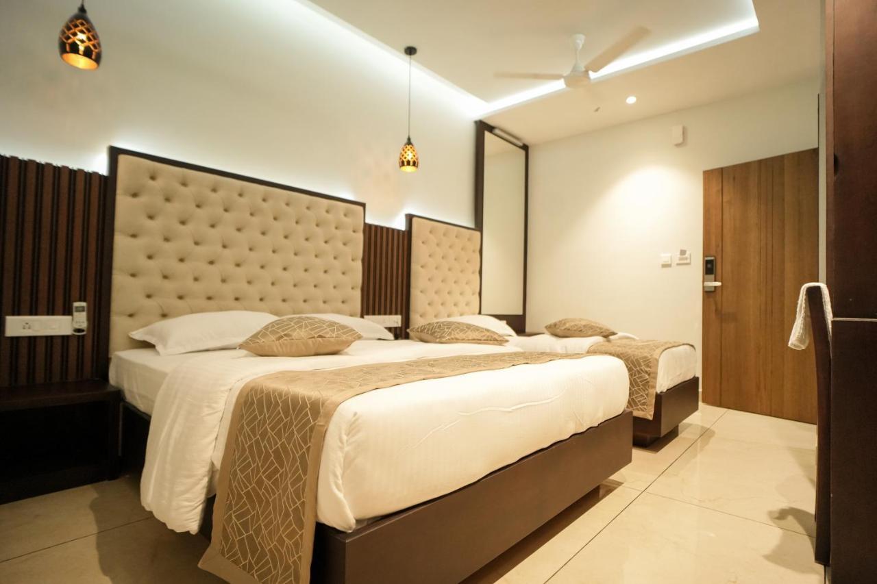 Sulu Residency Hotel Kochi Buitenkant foto